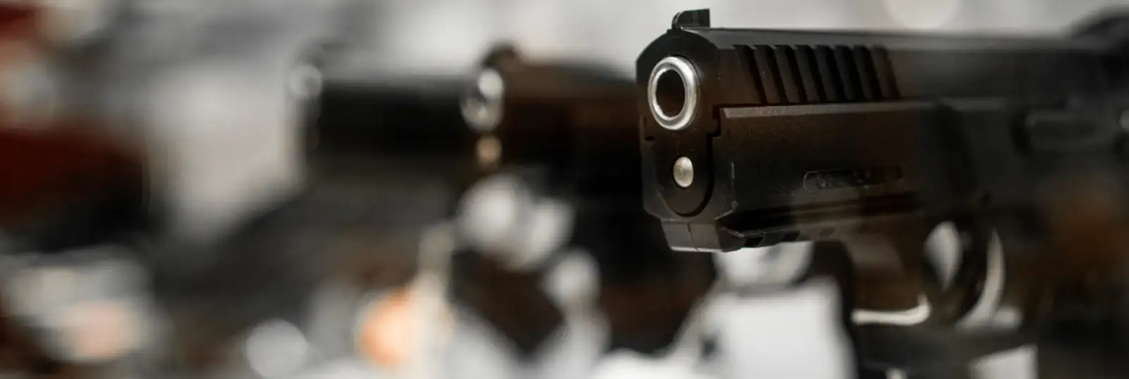 Close-up of a handgun representing law enforcement firearms